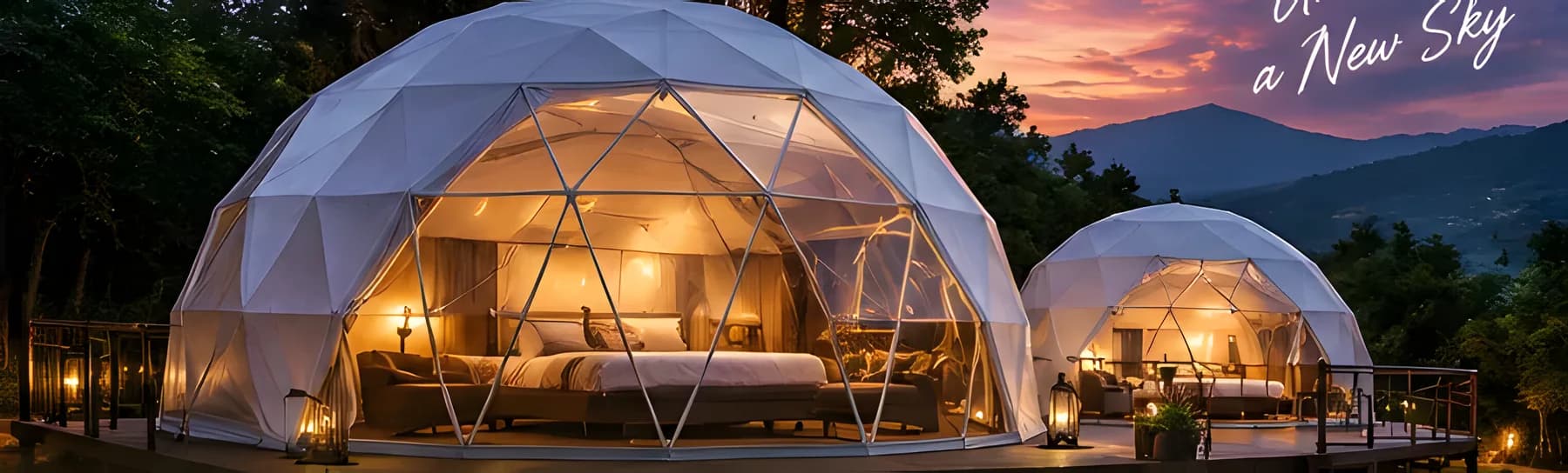 Two transparent dome stays glowing at dusk among trees